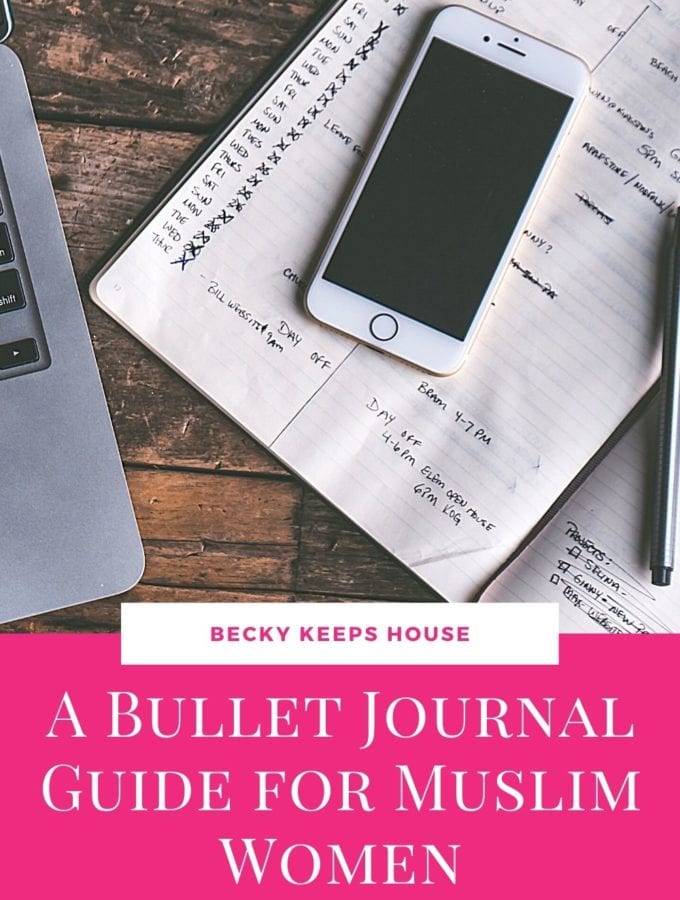 An iphone on a Bullet Journal next to a laptop with the words A Bullet Journal Guide for Muslim Women.