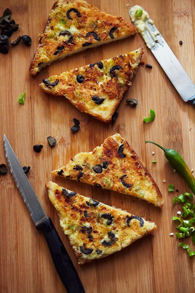 Chilli Cheese Toast with Garlic & Olives | Becky Keeps House - This chilli cheese toast with garlic and olives recipe is as versatile as it is tasty. It's the perfect canapé, breakfast, lunch, snack or tea time treat!