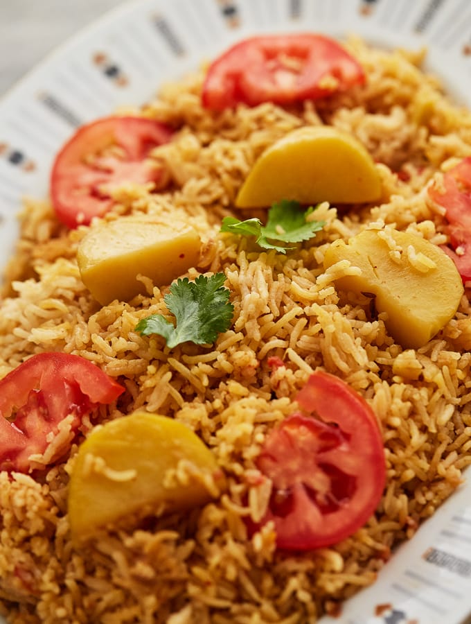 A serving dish of Tehari (Spiced Rice and Potatoes).